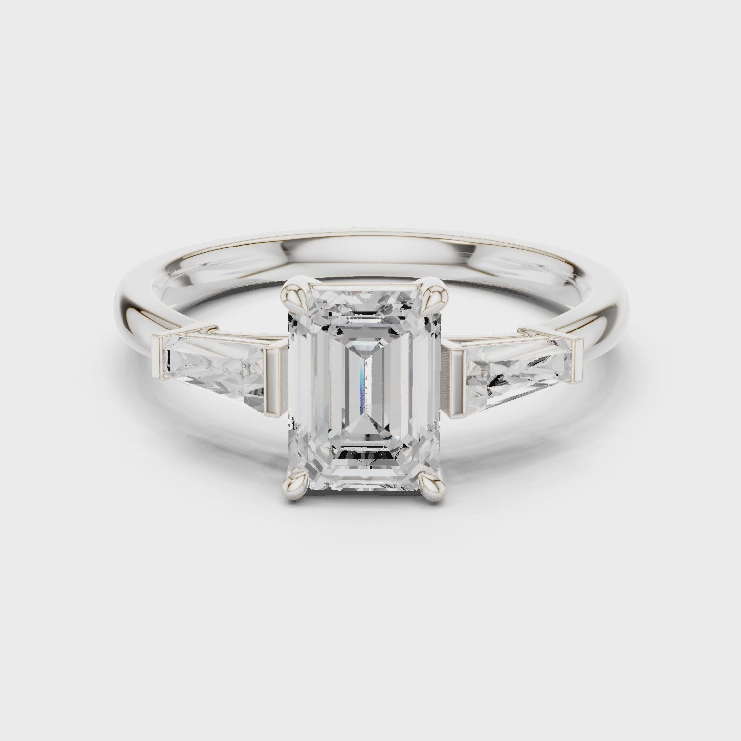 Gold Three-Stone Baguette Engagement Ring, Emerald center stone, White Gold, 360 video