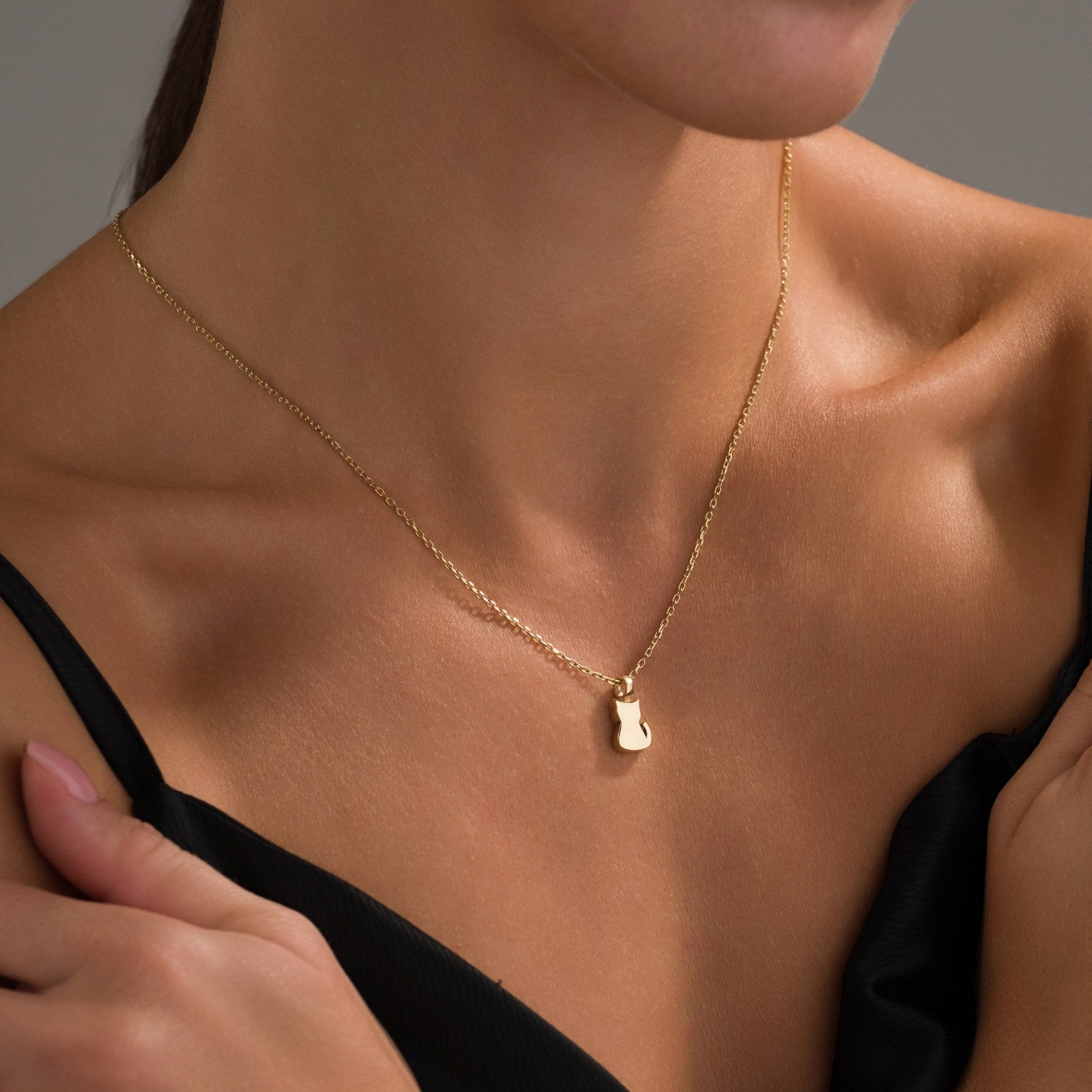 Gold Cat Urn Necklace, worn